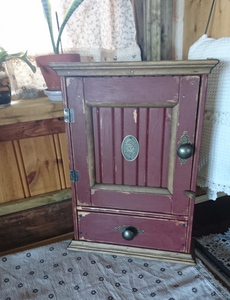 Storage cabinet with drawer