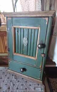 Storage cabinet with drawer