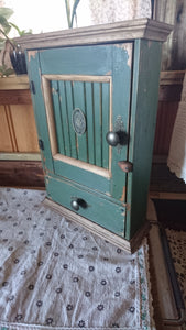 Storage cabinet with drawer